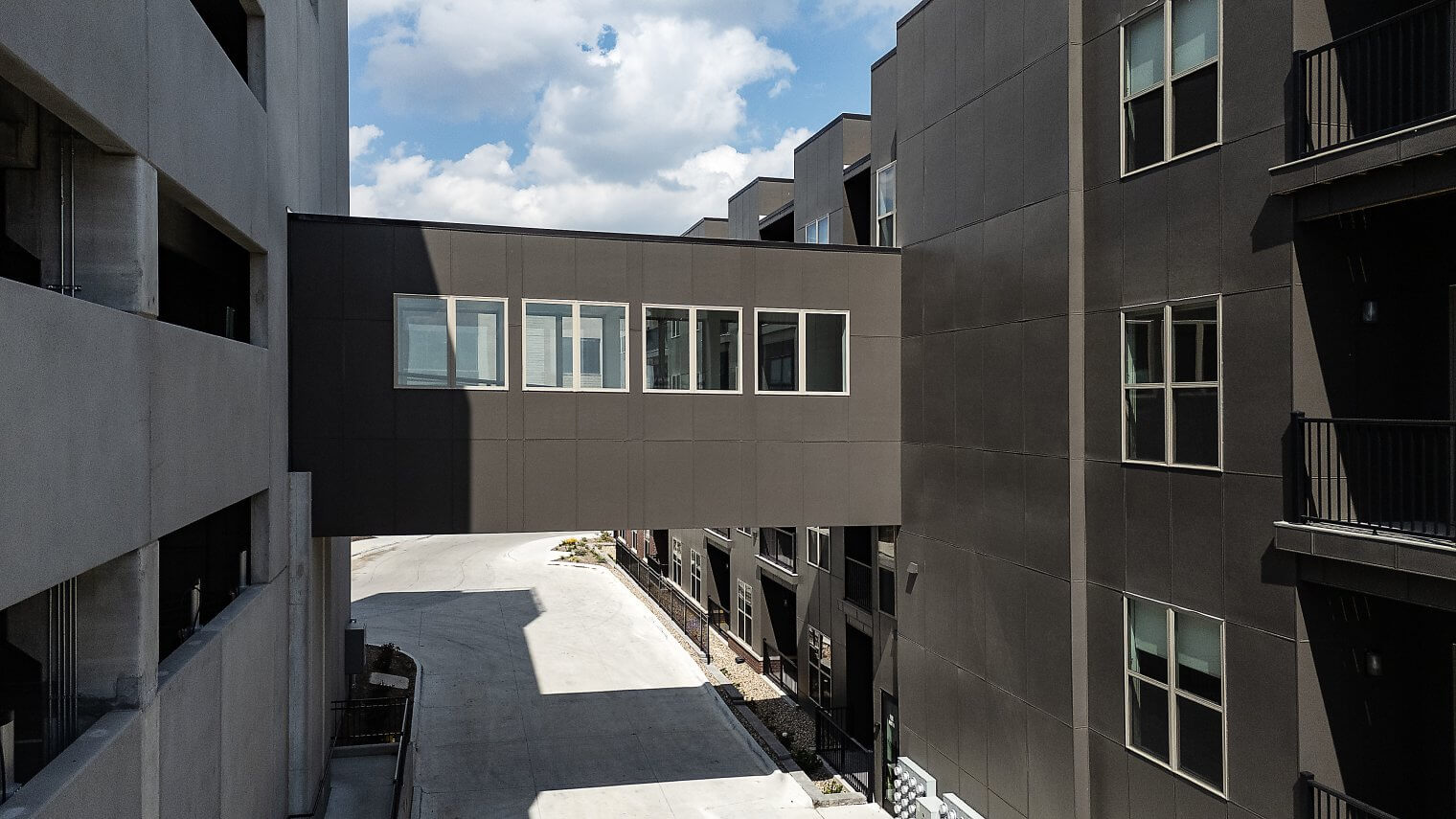ajax at askarben exterior amenity temperature controlled parking garage walkway 02