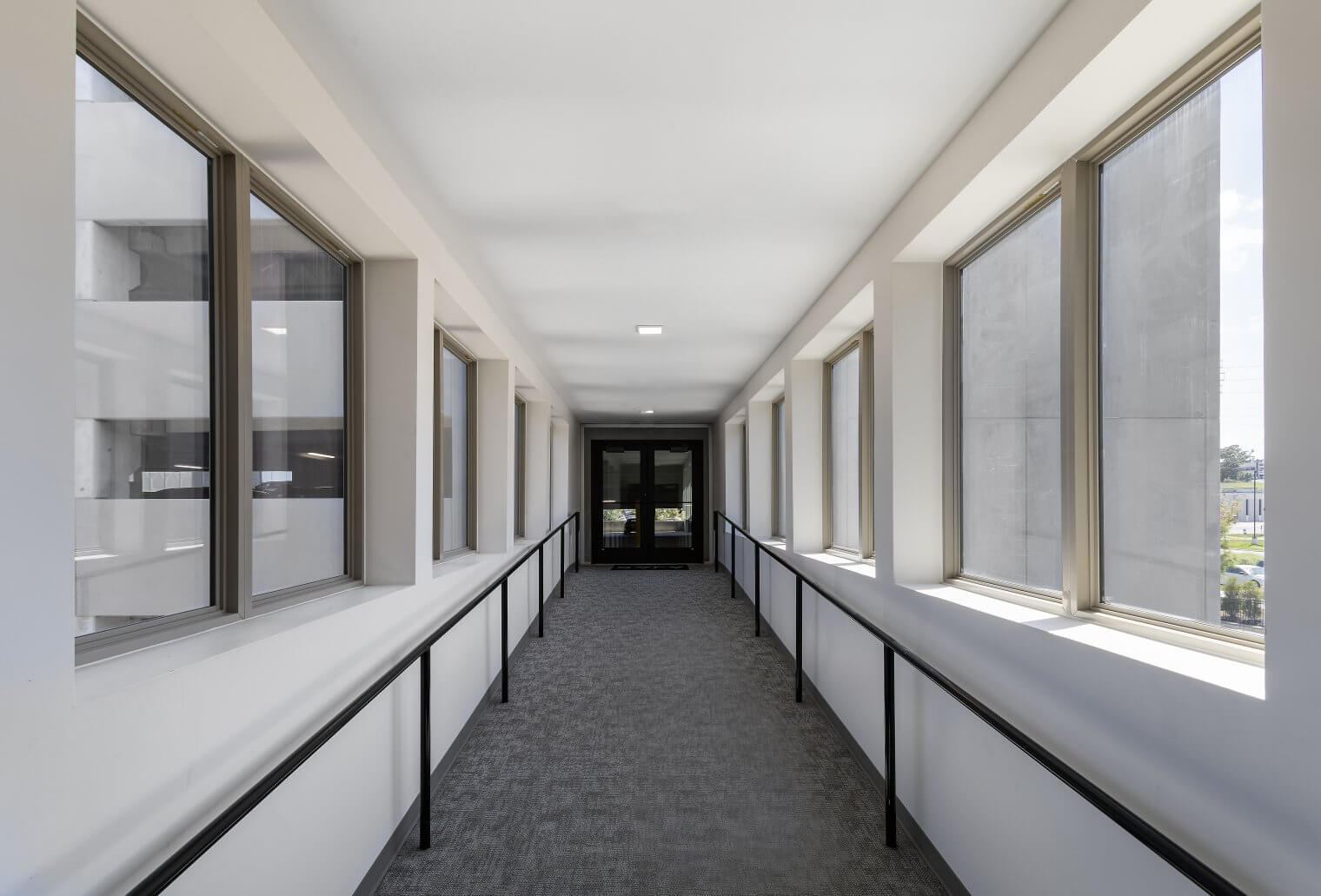ajax at askarben interior amenity temperature controlled parking garage walkway 01
